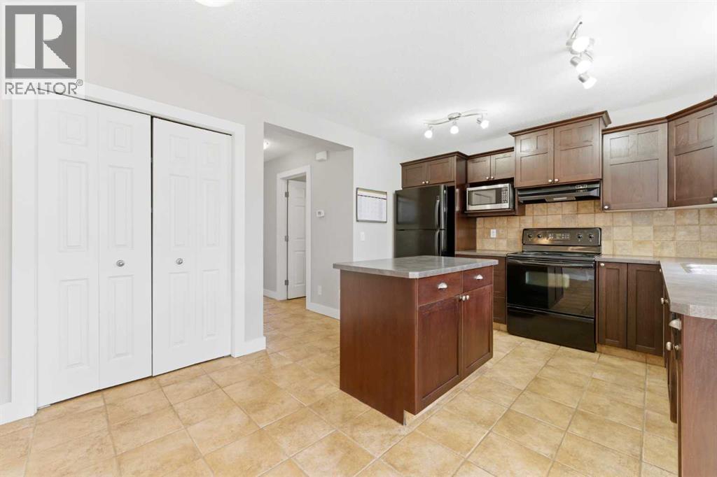 25 Everridge Way Sw, Calgary, Alberta  T2Y 4S1 - Photo 7 - A2309115