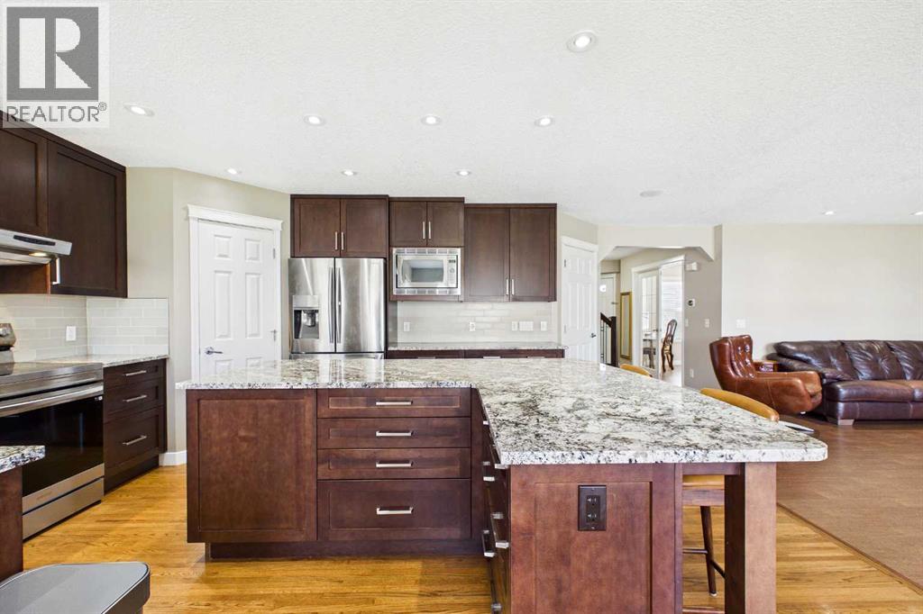 149 Tuscany Ravine Bay Nw, Calgary, Alberta  T3L 2S9 - Photo 7 - A2309418