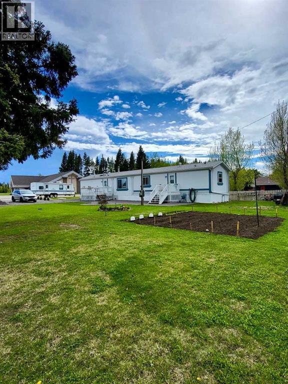 106 3 Avenue, Leslieville, Alberta  T0M 1H0 - Photo 2 - A2309351