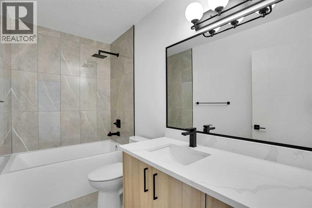 908 Stonehaven Road Sw, Calgary, Alberta  T2W 0P6 - Photo 21 - A2308929