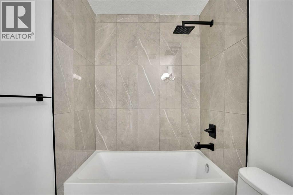 908 Stonehaven Road Sw, Calgary, Alberta  T2W 0P6 - Photo 22 - A2308929