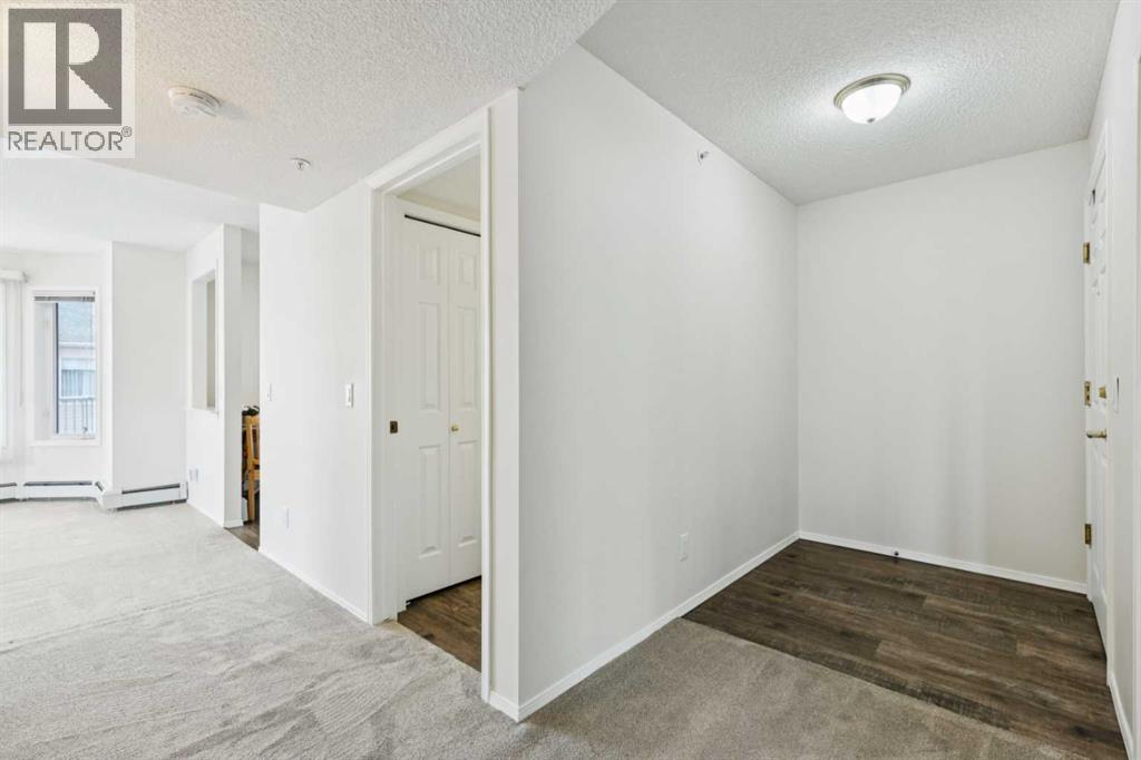 2309, 2309 Hawksbrow Point Nw, Calgary, Alberta  T3G 4C9 - Photo 3 - A2306023