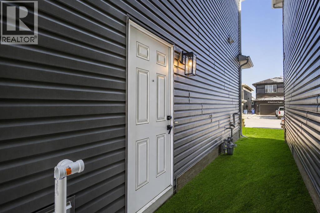 65 Amblefield Heights Nw, Calgary, Alberta  T3P 2K1 - Photo 3 - A2301798