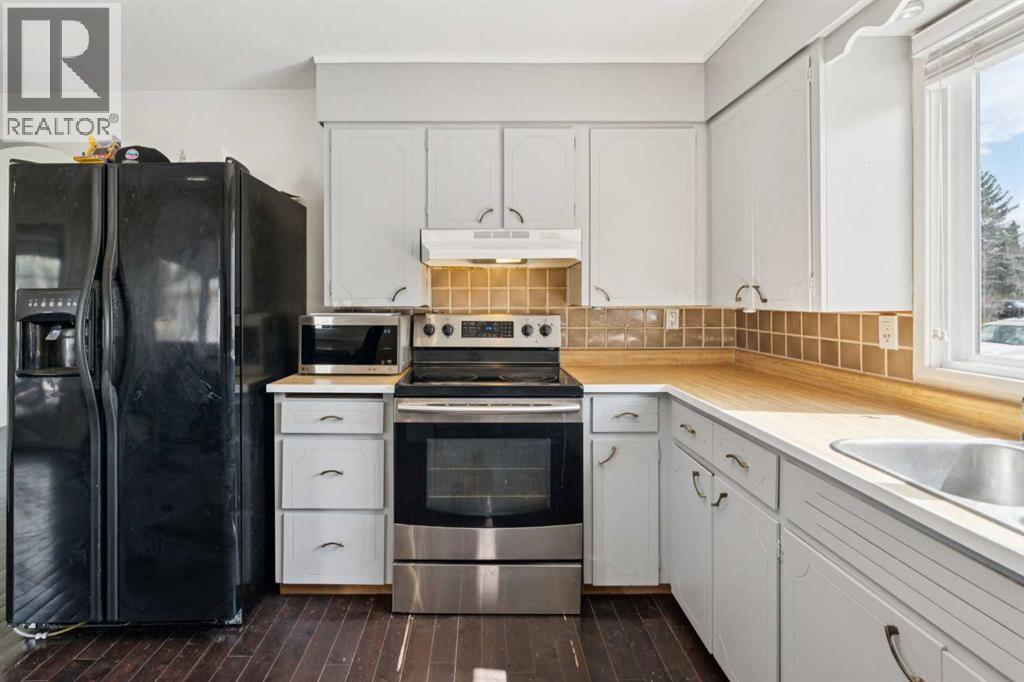 214 Springwood Place Sw, Calgary, Alberta  T2W 0L3 - Photo 10 - A2307366