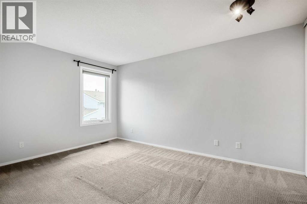 103 Coachway Lane Sw, Calgary, Alberta  T3H 2V9 - Photo 30 - A2290563