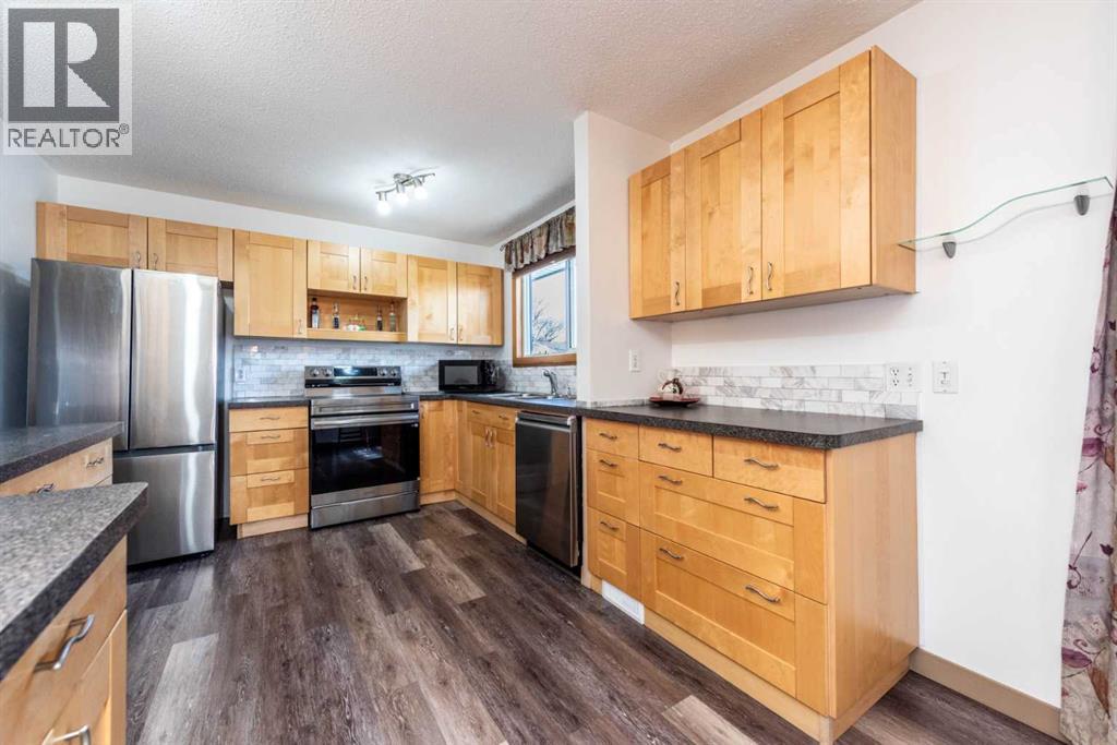 16 Rundleson Way Ne, Calgary, Alberta  T1Y 3N6 - Photo 12 - A2307601