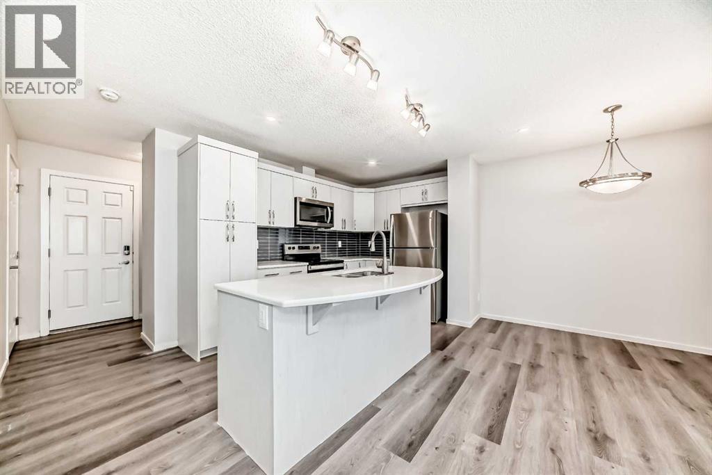 1337 140 Avenue NW, Calgary, Alberta  T2K 0E3 - Photo 5 - A2275880