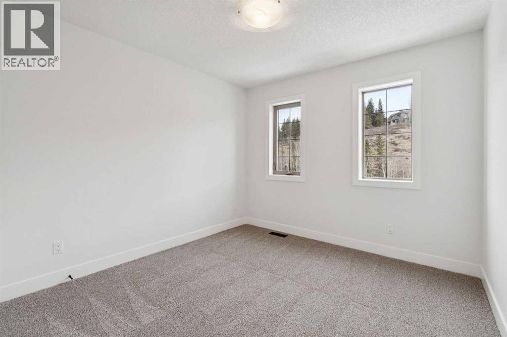 1 Discovery Ridge Link Sw, Calgary, Alberta  T3H 4Y1 - Photo 18 - A2291643