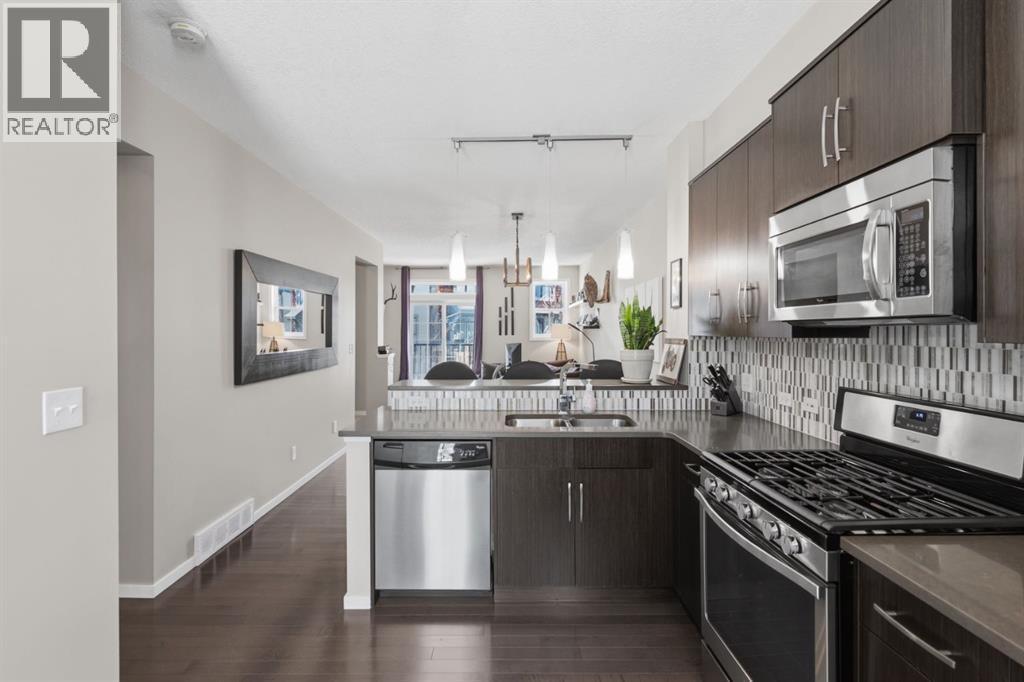 412 Ascot Circle Sw, Calgary, Alberta  T3H 0X3 - Photo 9 - A2299304