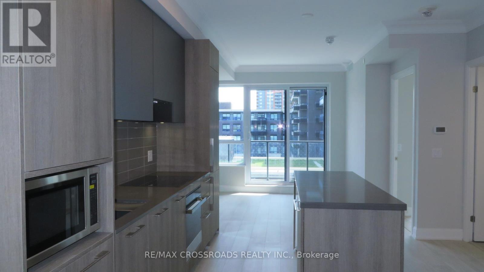 610 - 18 Water Walk Drive, Markham, Ontario  L3R 6L5 - Photo 2 - N13109884