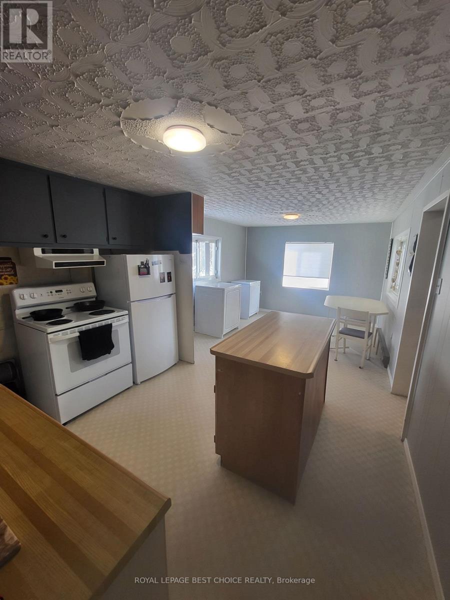 20 Goward Avenue, Temagami, Ontario  P0H 2H0 - Photo 6 - X12930474