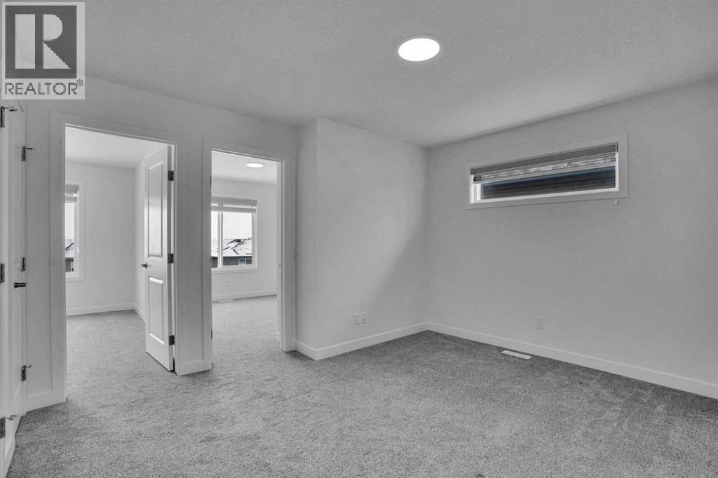 26 Amblehurst Path Nw, Calgary, Alberta  T3P 1W8 - Photo 21 - A2297433