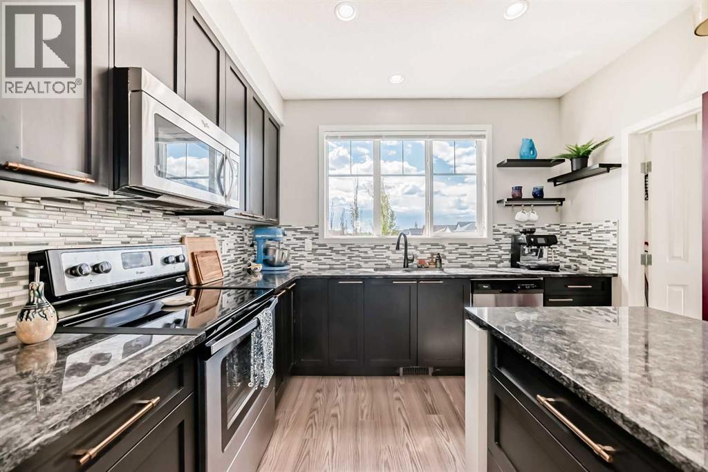 113 Copperpond Row Se, Calgary, Alberta  T2Z 1H3 - Photo 9 - A2302891