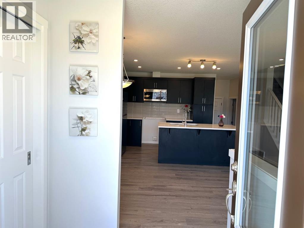 2226 Windbury Greenway Sw, Airdrie, Alberta  T4B 5L2 - Photo 5 - A2305980
