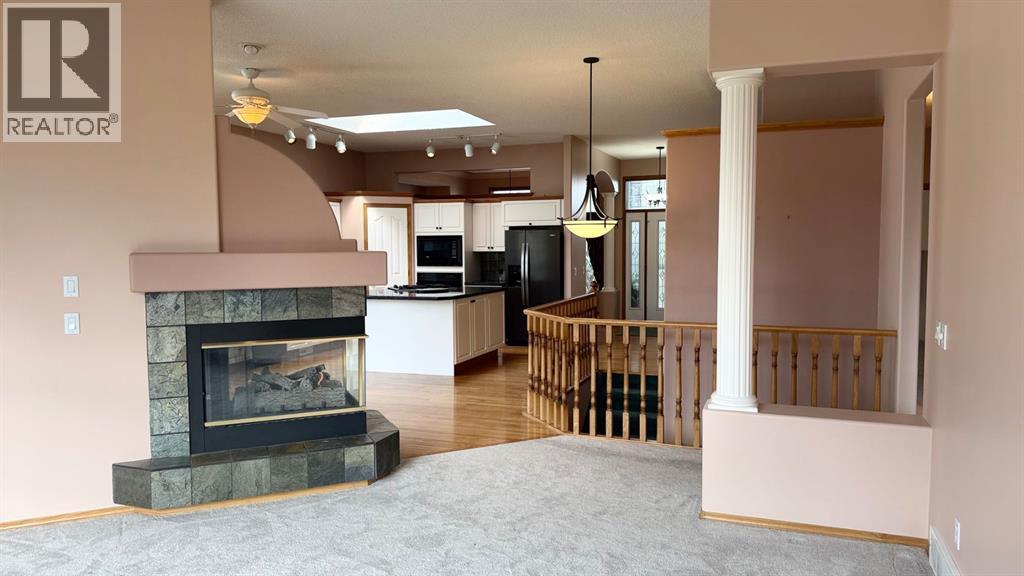 117 Woodpark Close Sw, Calgary, Alberta  T2W 6H1 - Photo 14 - A2309782