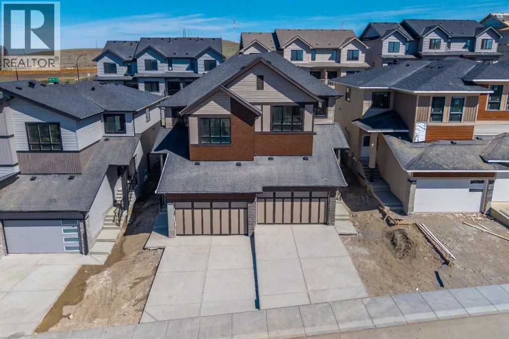 87 Heritage Manor, Cochrane, Alberta  T4C 0L3 - Photo 3 - A2281386