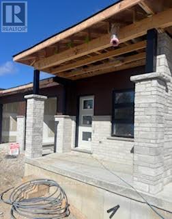 Unit 2 - 345 Durham Street East Street E, Wellington North, Ontario  N0G 2L2 - Photo 1 - X12442527