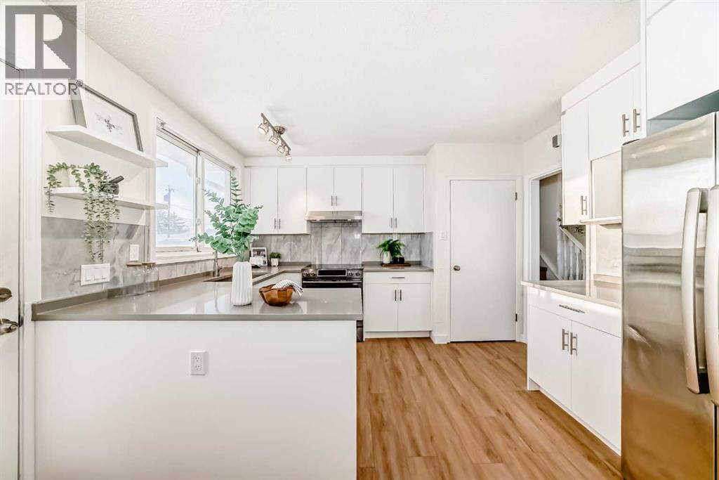 5640 Travis Street NE, Calgary, Alberta  T2K 3W2 - Photo 3 - A2287901
