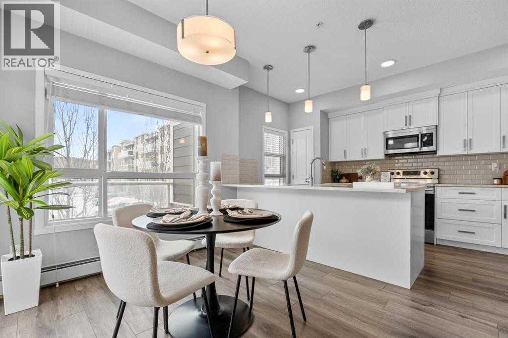 107, 360 Harvest Hills Common NE, Calgary, Alberta  T3K 2N1 - Photo 2 - A2305983
