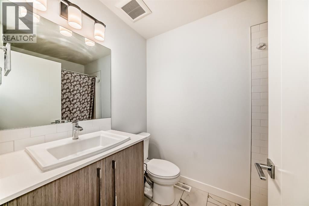 202 Creekstone Drive SW, Calgary, Alberta  T2X 5L1 - Photo 27 - A2292470