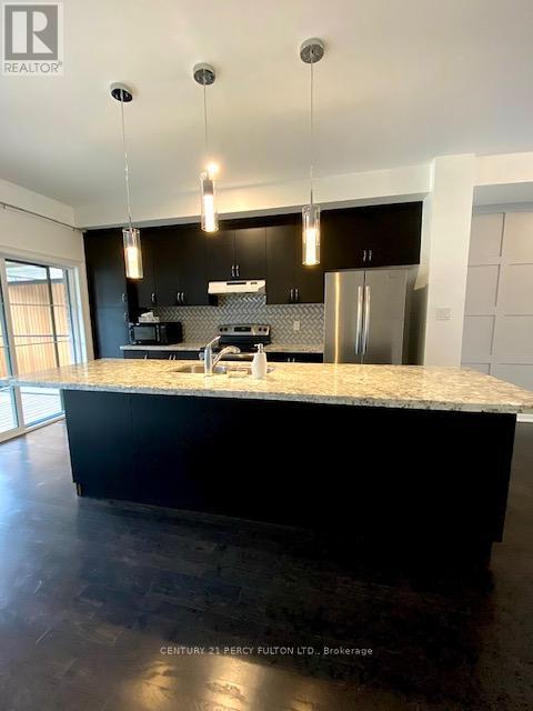 47 Dryden Way, Toronto, Ontario  M9R 0B2 - Photo 3 - W13113704