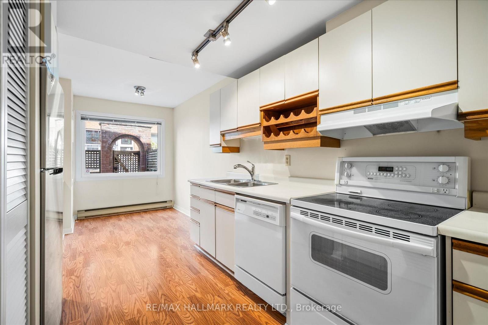 1 - 122 Glen Manor Drive, Toronto, Ontario  M4E 2X6 - Photo 11 - E13113972