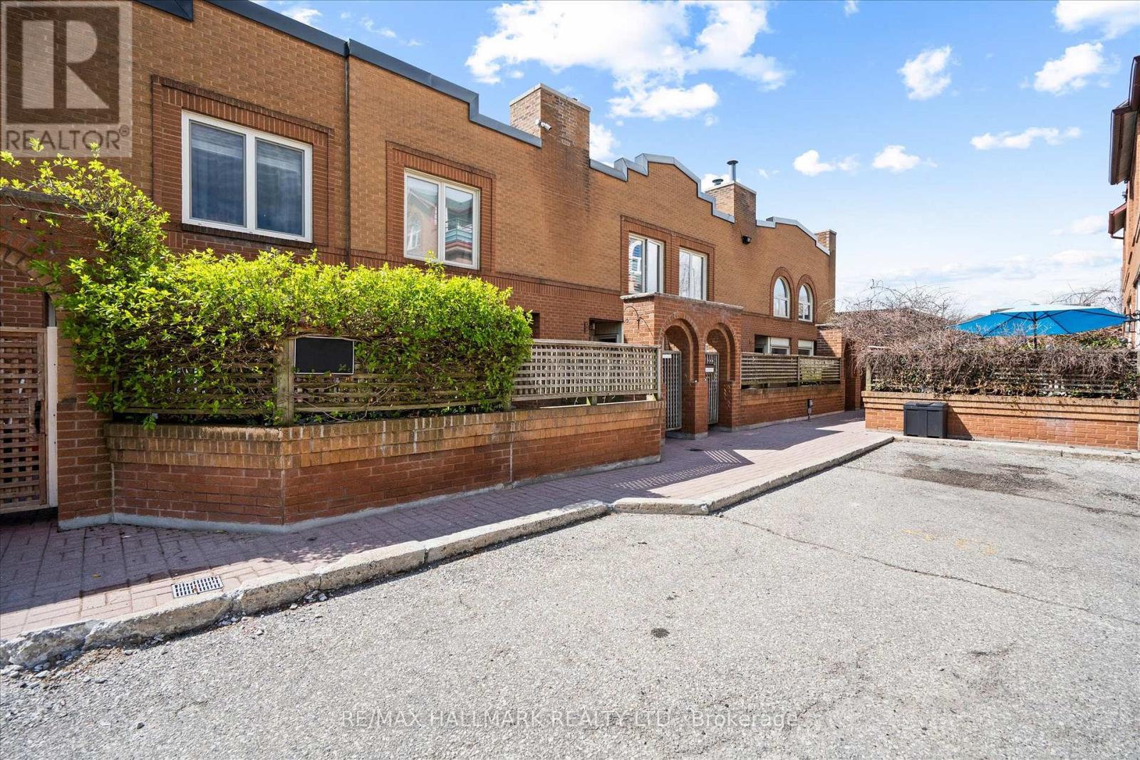 1 - 122 Glen Manor Drive, Toronto, Ontario  M4E 2X6 - Photo 2 - E13113972