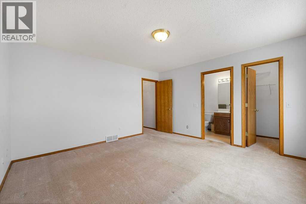 9119 Scurfield Drive Nw, Calgary, Alberta  T3L 1X7 - Photo 32 - A2293959