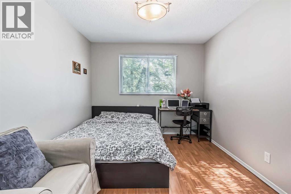 1451 Berkley Drive Nw, Calgary, Alberta  T3K 1T6 - Photo 25 - A2273015
