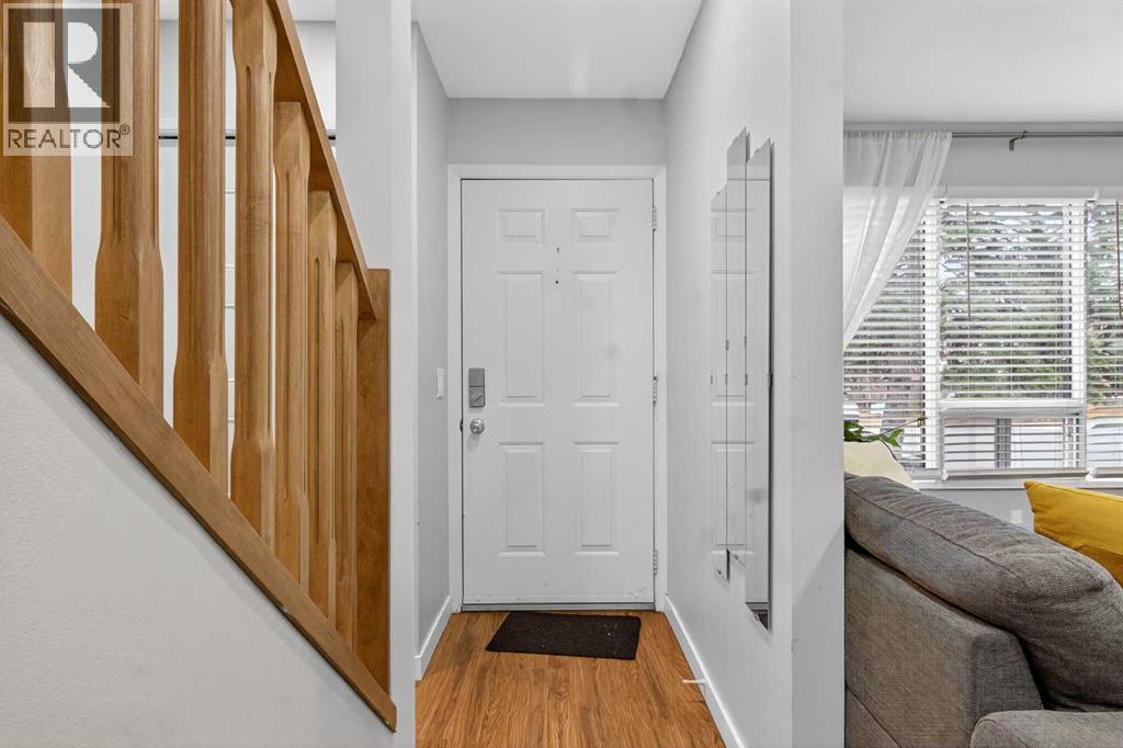 1451 Berkley Drive Nw, Calgary, Alberta  T3K 1T6 - Photo 2 - A2273015