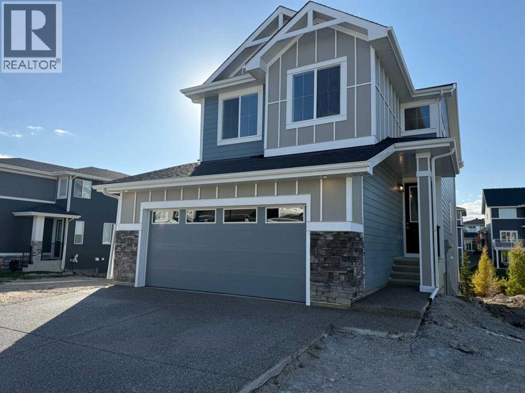 91 Sundown Crescent, Cochrane, Alberta  T4C 1Y3 - Photo 1 - A2228402