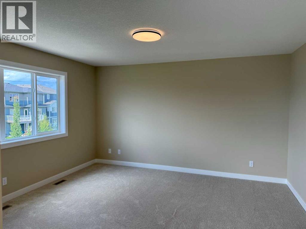 91 Sundown Crescent, Cochrane, Alberta  T4C 1Y3 - Photo 39 - A2228402