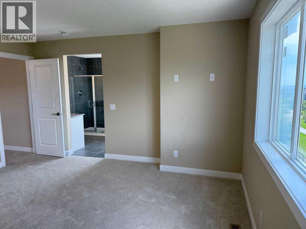 91 Sundown Crescent, Cochrane, Alberta  T4C 1Y3 - Photo 40 - A2228402