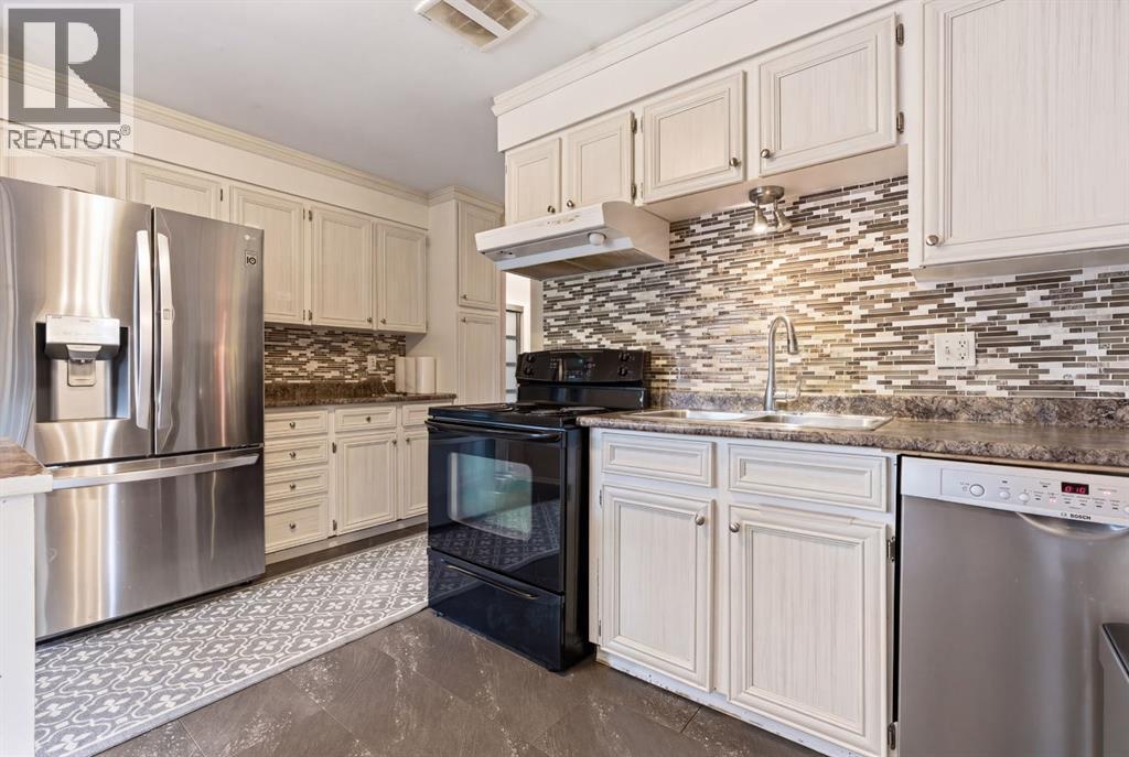 1703 110 Avenue Sw, Calgary, Alberta  T2W 0E4 - Photo 14 - A2310314