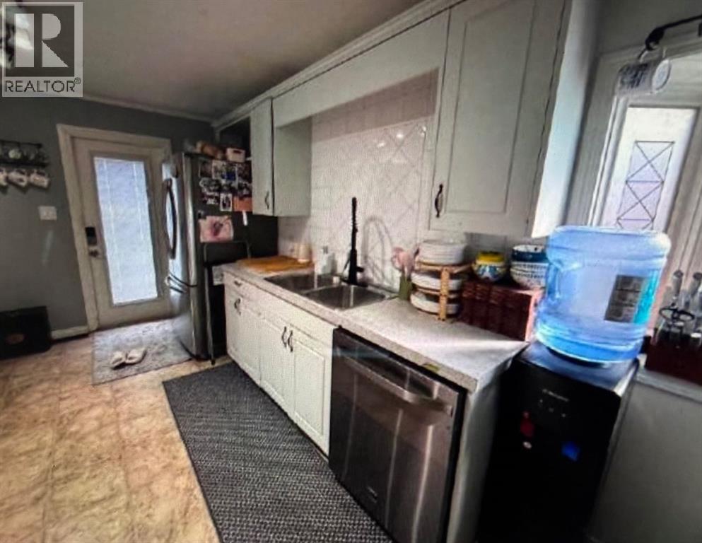 1241 8 Avenue S, Lethbridge, Alberta  T1J 1R2 - Photo 3 - A2309294