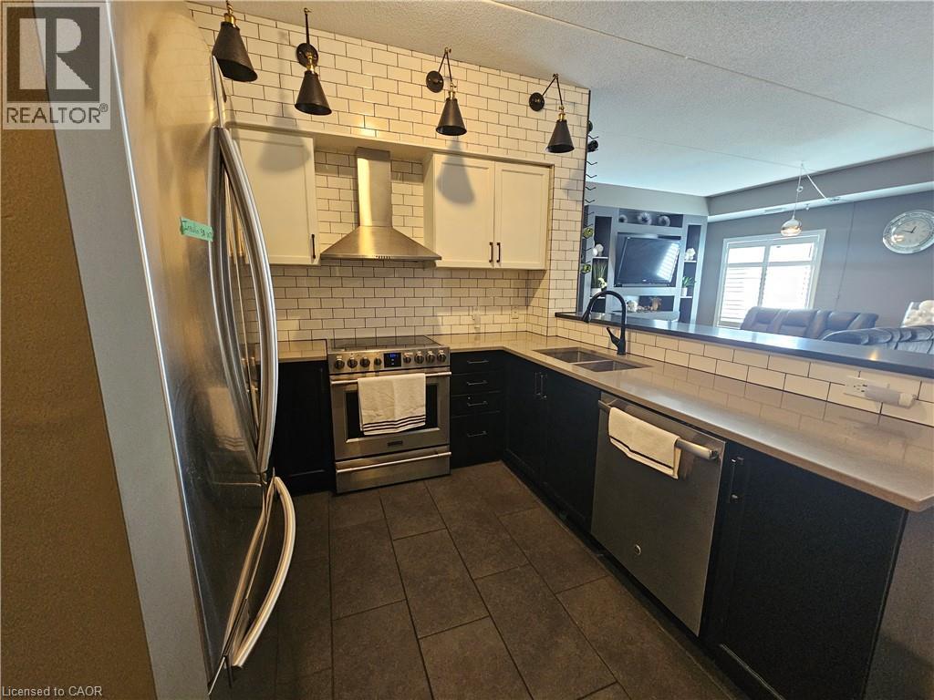 308 Watson Parkway N Unit# 102, Guelph, Ontario  N1E 0G7 - Photo 3 - 40809663