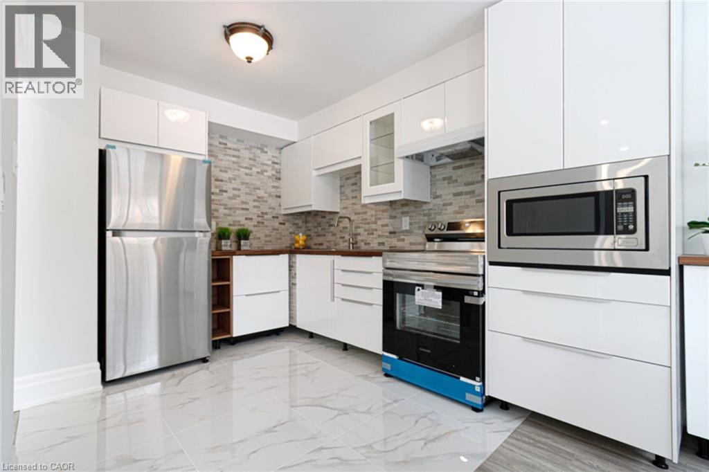 1532 Lancaster Drive Unit# 41, Oakville, Ontario  L6H 2Z3 - Photo 12 - 40829376