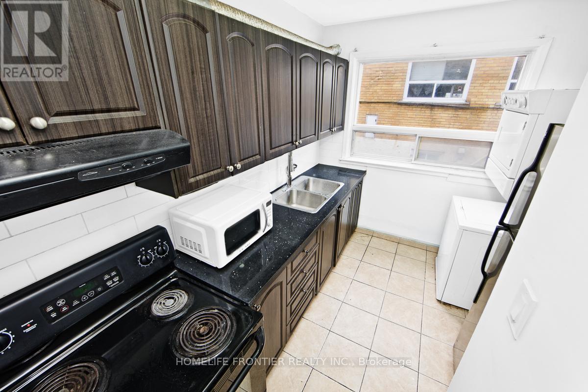 2953 Lawrence Avenue E, Toronto, Ontario  M1P 2V6 - Photo 7 - E13115754