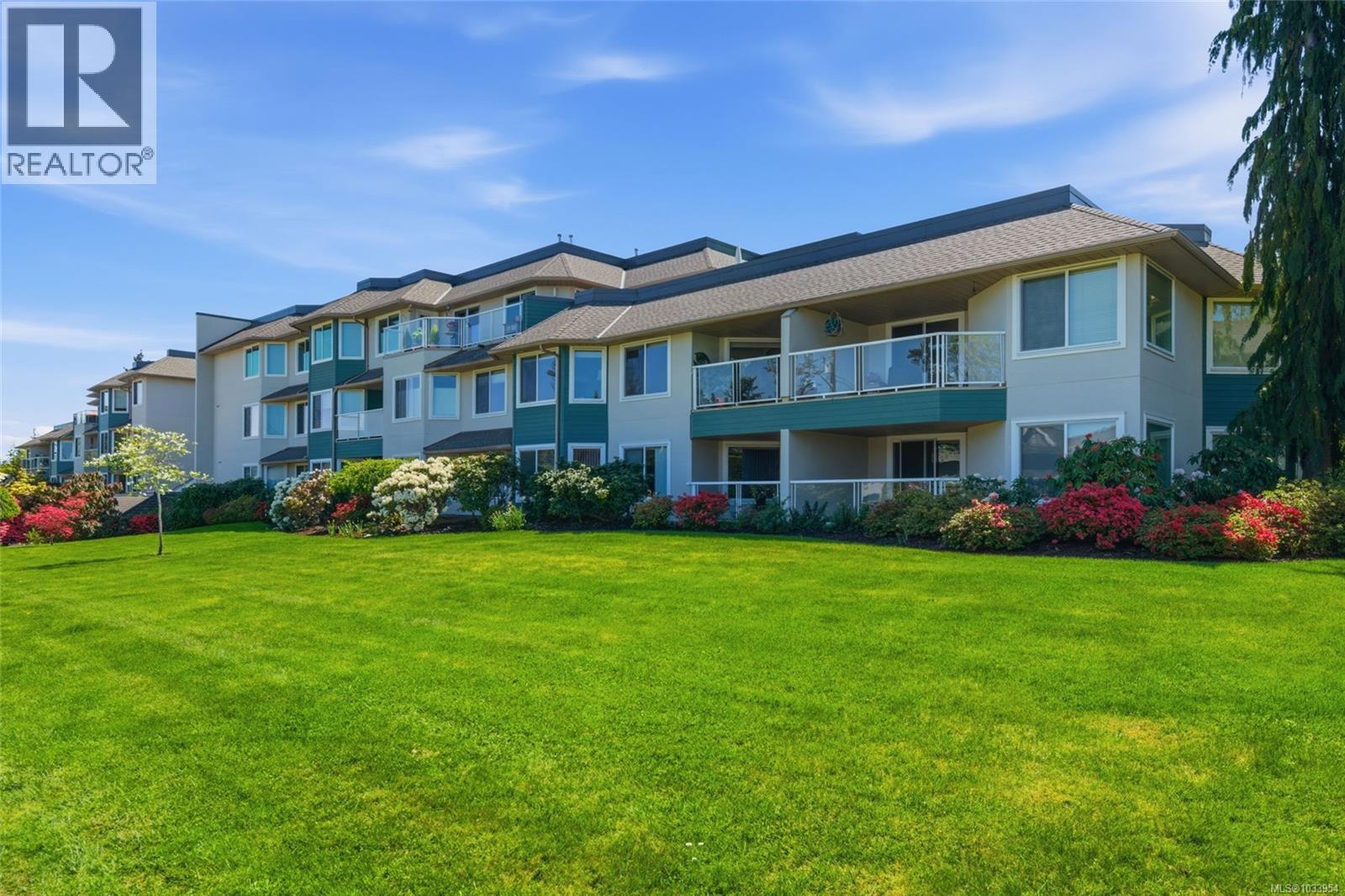 101 134 Fifth Ave E, Qualicum Beach, British Columbia  V9K 1Y7 - Photo 1 - 1033954