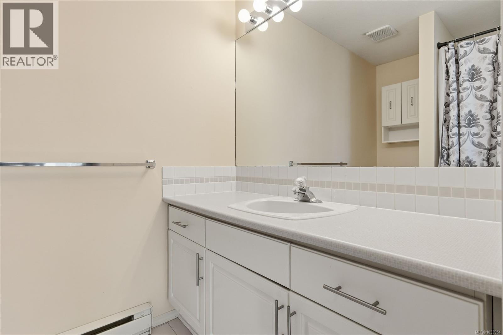 101 134 Fifth Ave E, Qualicum Beach, British Columbia  V9K 1Y7 - Photo 23 - 1033954