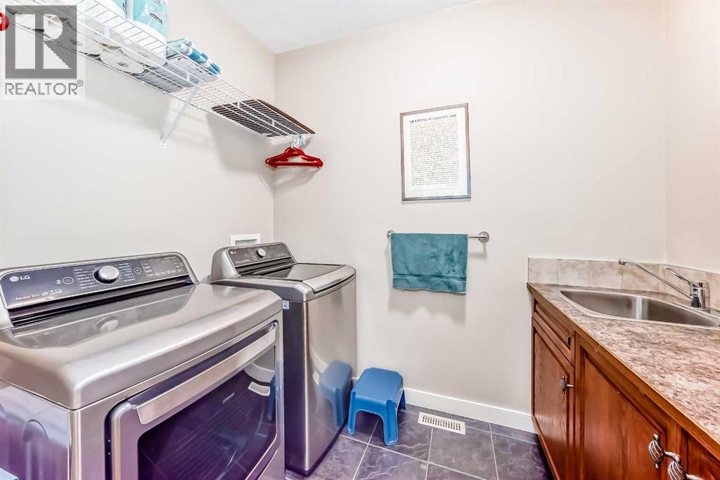 487 Rocky Ridge Drive NW, Calgary, Alberta  T3G 5C3 - Photo 18 - A2290057