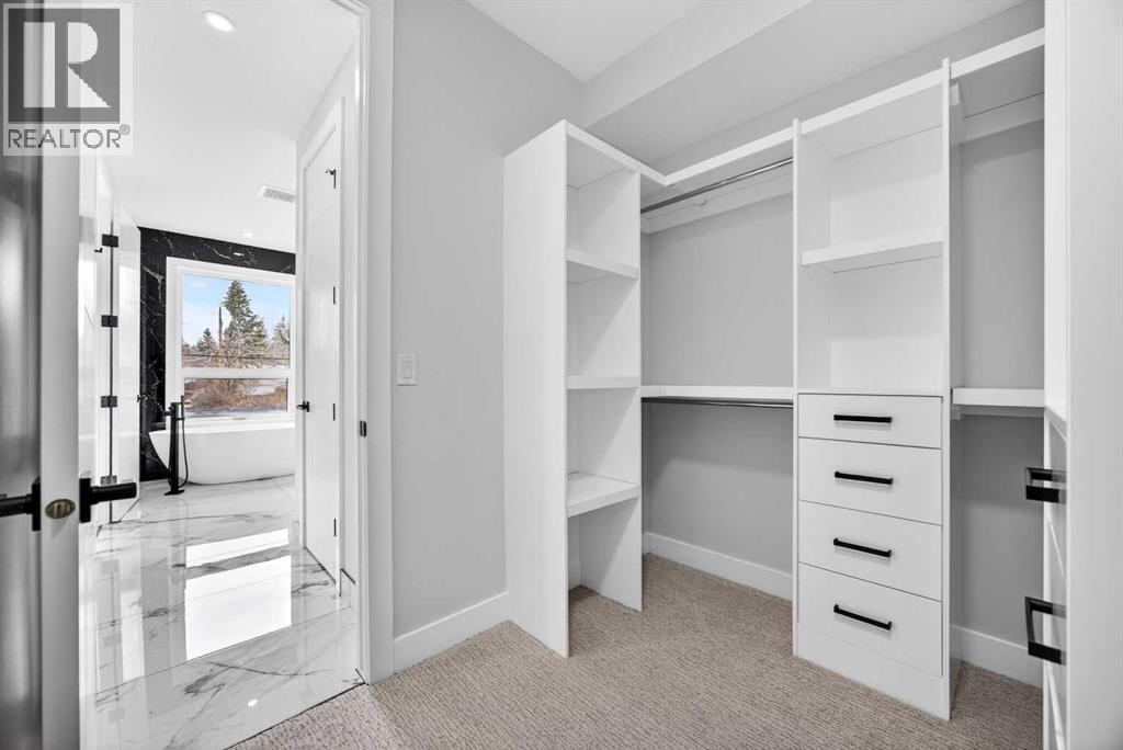 107 Hartford Road NW, Calgary, Alberta  T2K 2A7 - Photo 31 - A2307258