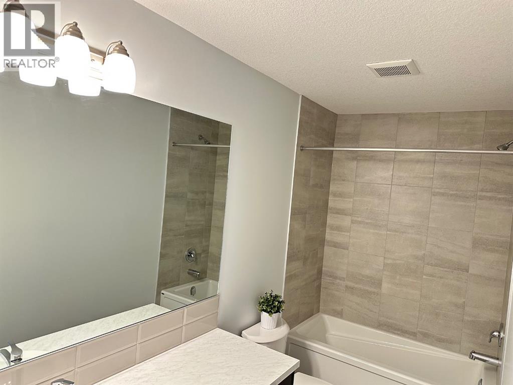 2226 Windbury Greenway Sw, Airdrie, Alberta  T4B 5L2 - Photo 39 - A2305980
