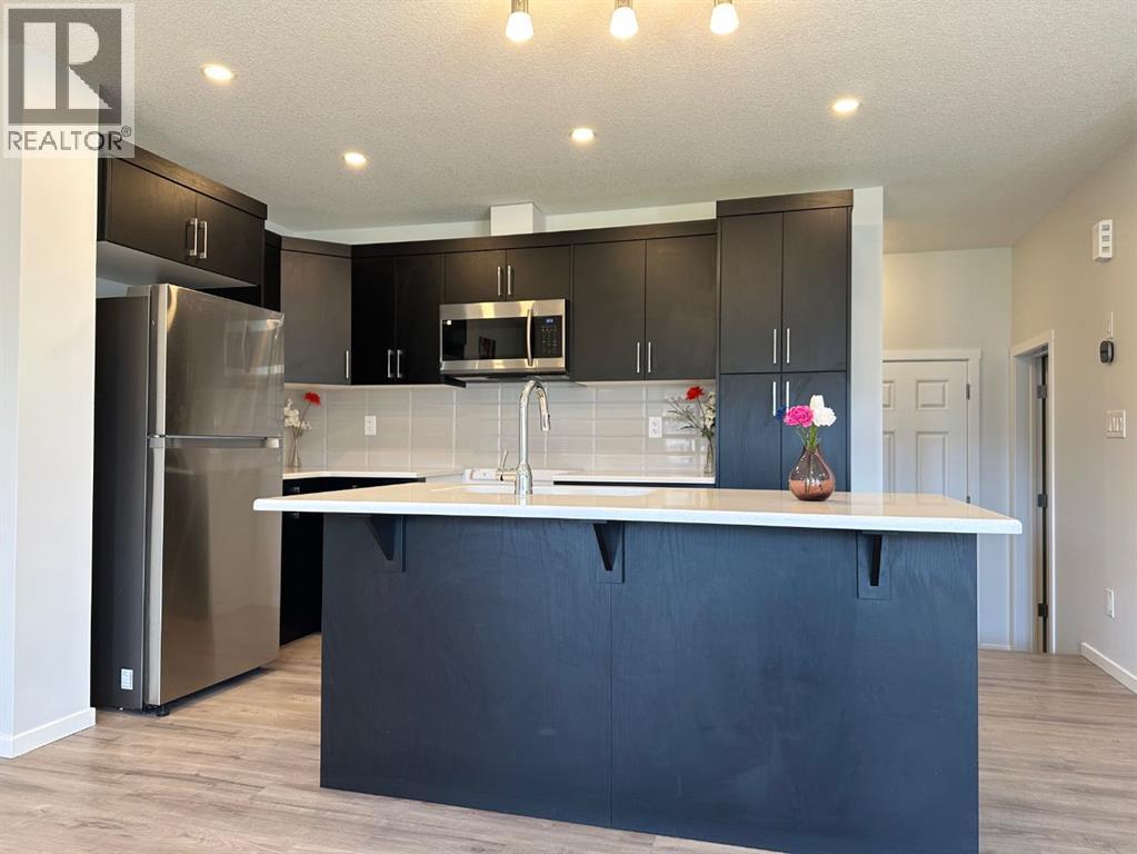 2226 Windbury Greenway Sw, Airdrie, Alberta  T4B 5L2 - Photo 12 - A2305980