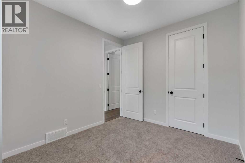 108 Creekview Manor SW, Calgary, Alberta  T2X 4Y1 - Photo 16 - A2271874