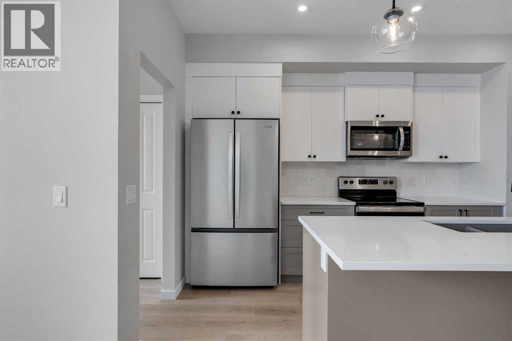 1277 Creekview Drive Sw, Calgary, Alberta  T2X 4Y1 - Photo 10 - A2271942