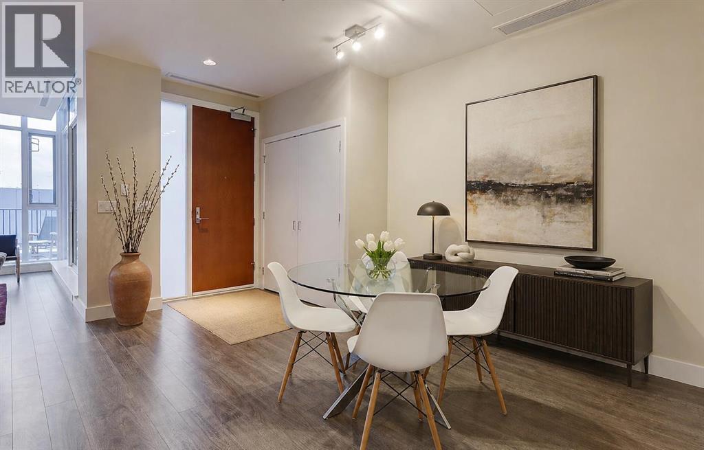 119 Confluence Mews Se, Calgary, Alberta  T2G 1J1 - Photo 5 - A2304002