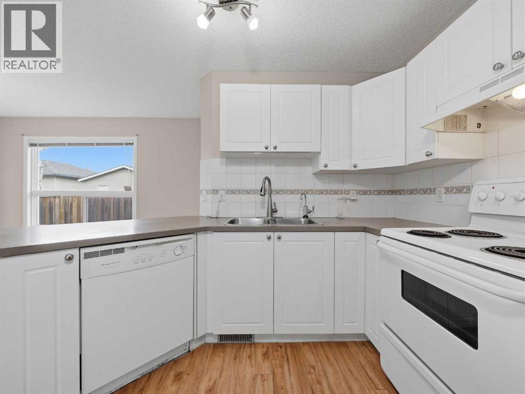 128 Taradale Drive Ne, Calgary, Alberta  T3J 5A9 - Photo 3 - A2308461