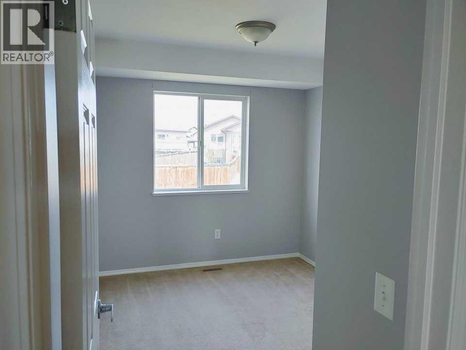 9350 Lakeland Drive, Grande Prairie, Alberta  T8X 1R8 - Photo 3 - A2309734