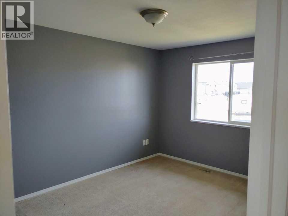9350 Lakeland Drive, Grande Prairie, Alberta  T8X 1R8 - Photo 4 - A2309734